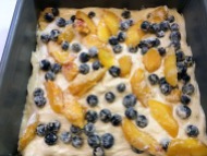 Top with half of the fruit mixture tossed in flour.