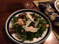 A salad of roasted and raw grapes, arugula, almonds and manchego with Saba vinaigrette.